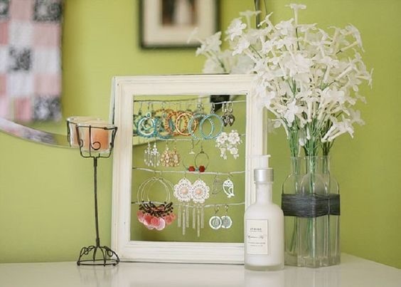 Vintage picture frames to store your jewelry. 